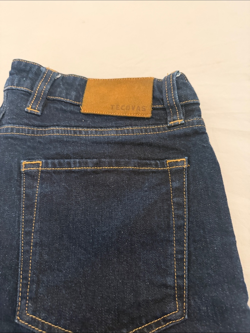 Tecovas Navy Denim Jeans with Tan Leather Patch